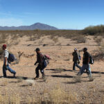 Undocumented Immigrants Cross Into The United States From Mexico